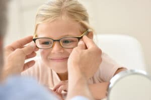 Child Getting Eye Glass Fitting