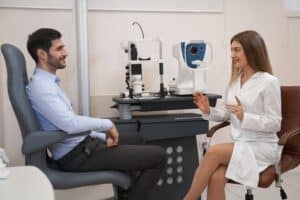 patient meeting with doctor to compare prk vs lasik vs smile